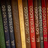 A row of yearbooks from the Kornberg School of Dentistry.